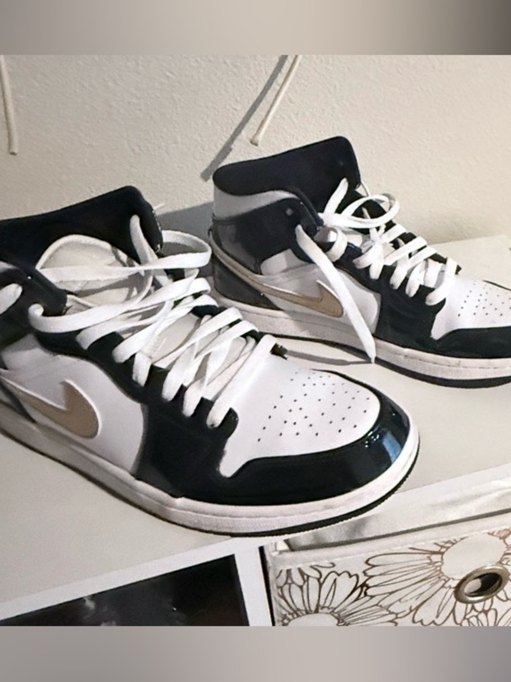 Nike Mid-Top Sneakers in White, Black and Gold Swoosh